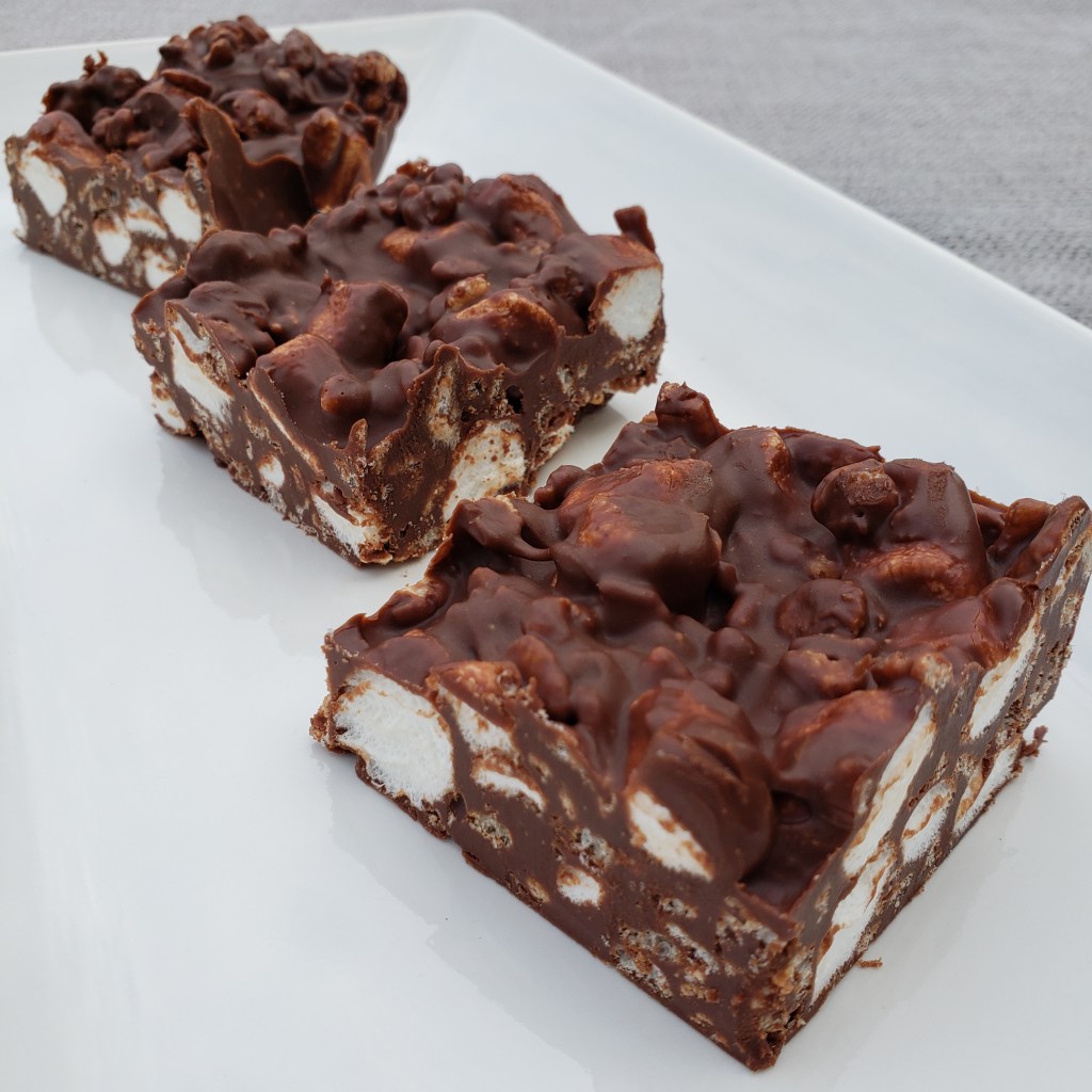 Rocky Road Bars packed full of marshmallows, peanut butter, rice cereal and chocolate.