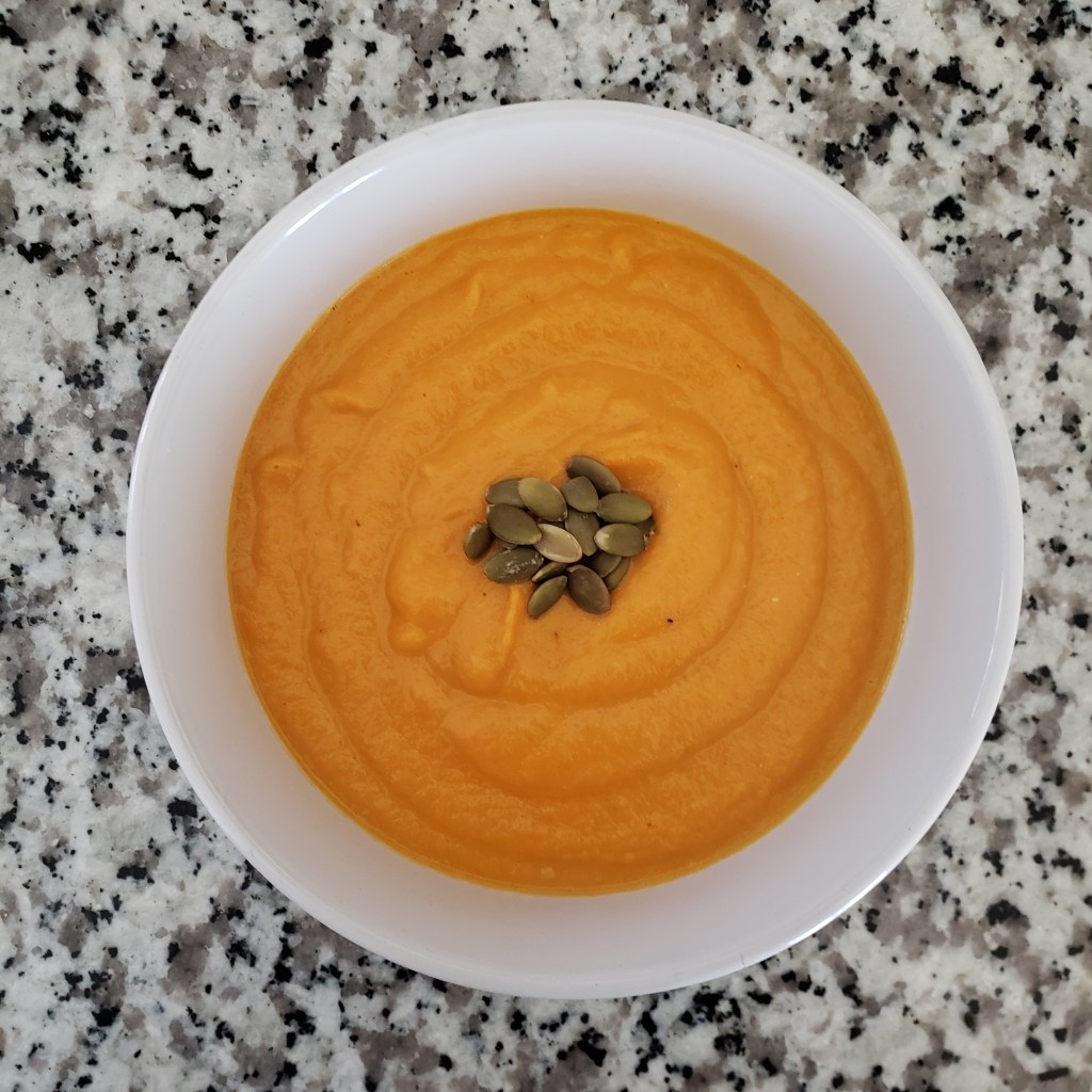 bowl of creamy carrot ginger soup